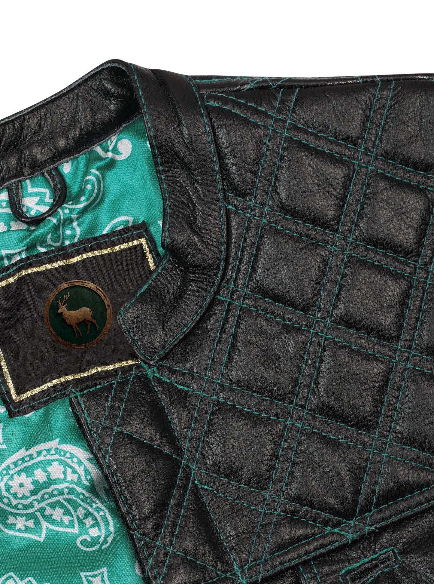 Close-up image of the satin lining inside the Turquoise Diamond Stitched MC Club Vest. Highlights premium craftsmanship, turquoise diamond stitched leather exterior, and brass zipper closure. Designed for motorcycle club members, road warriors, and bikers. Customizable with patches, colors, and concealed carry option. A rugged yet stylish turquoise biker vest for rebels and riders.