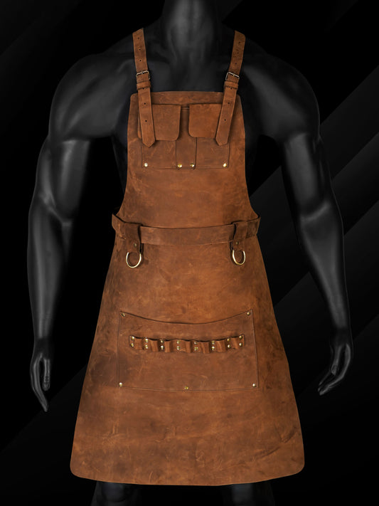 Handmade full-grain pull-up leather BBQ apron featuring adjustable leather straps, brass buckles, dual towel rings, and multiple tool pockets. Designed for chefs, barbers, grill enthusiasts, and DIY professionals seeking a durable, personalized workwear solution. Ideal as a custom gift for Dad, Mom, or any hardworking individual.