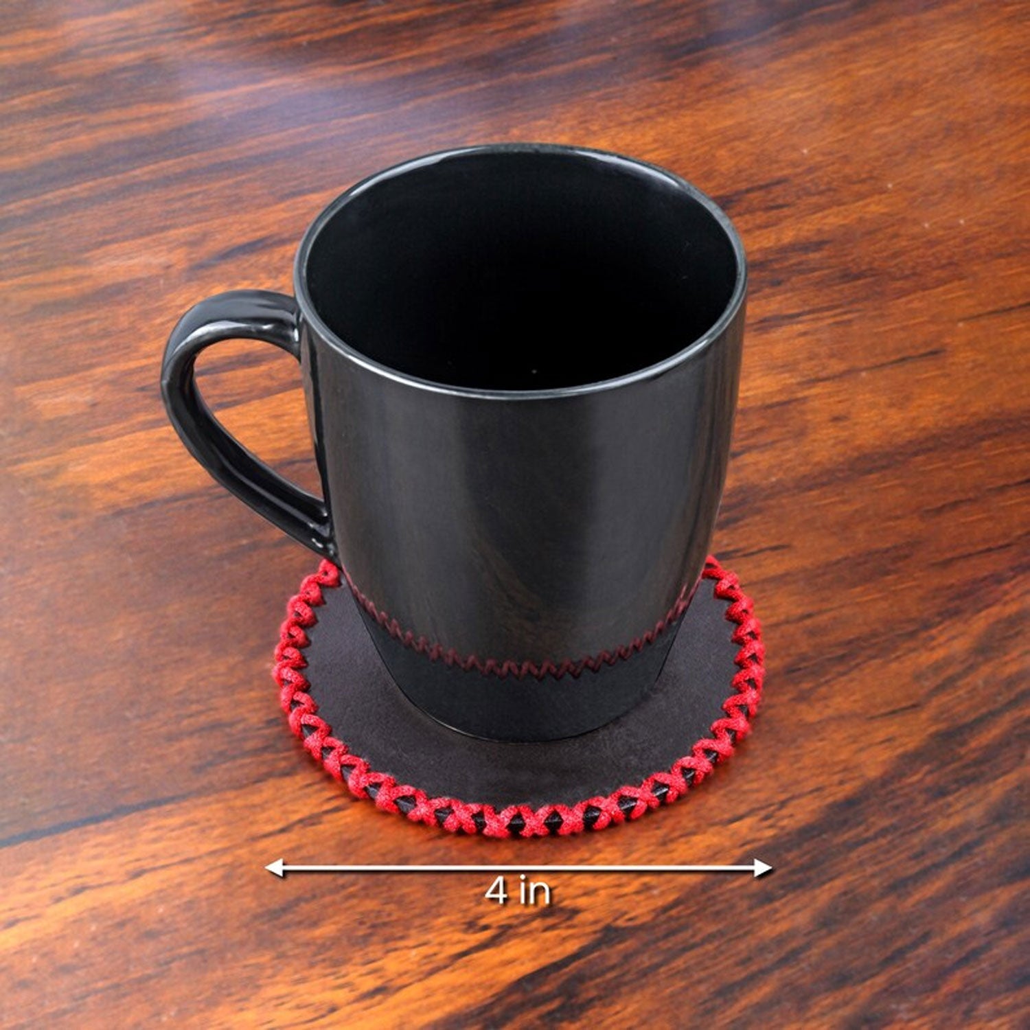 Leather coasters placed beneath coffee mugs and whiskey glasses on a wooden bar counter, highlighting their stylish utility and handmade charm in a real-life setting.

