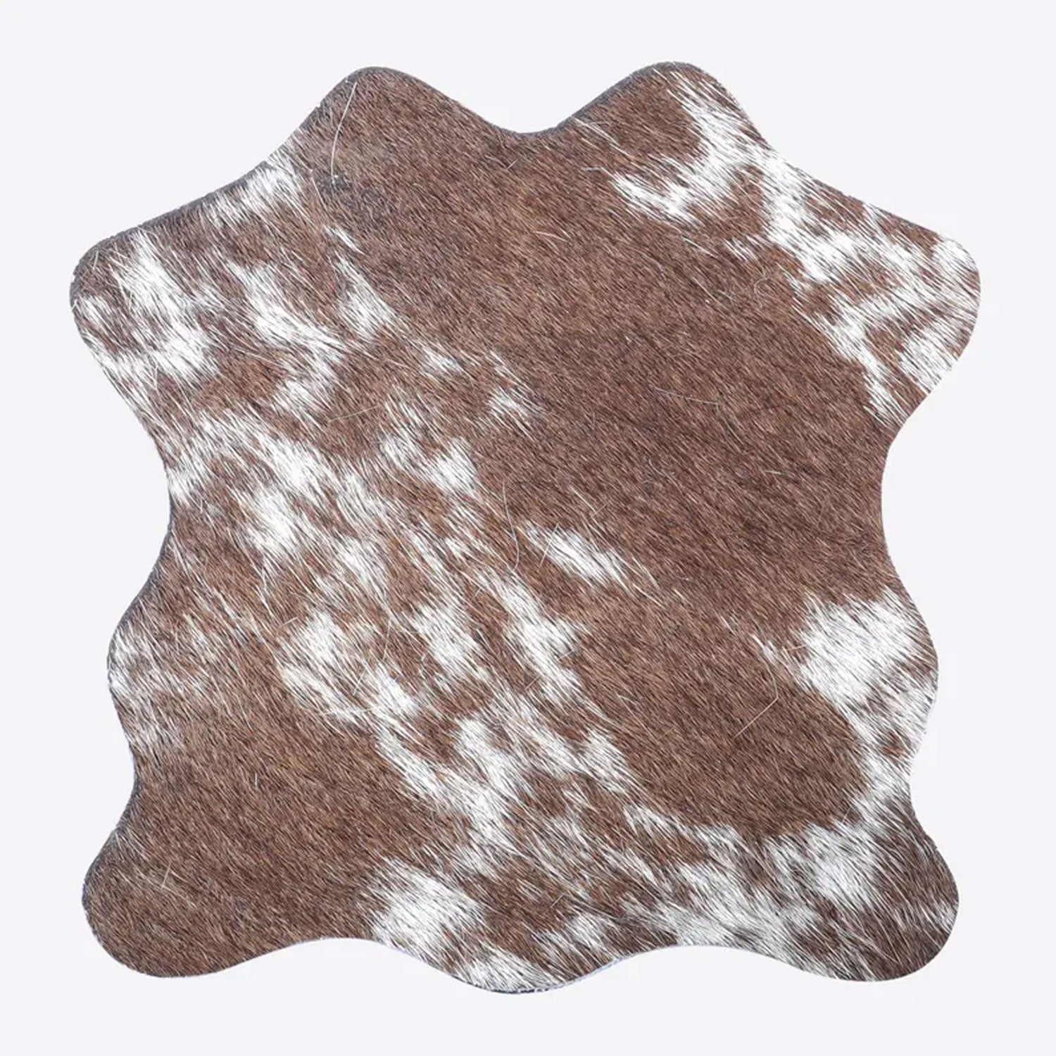 Close-up image highlighting the hair-on cowhide texture and natural animal print variations, emphasizing luxury craftsmanship and rustic aesthetic for drink protection.

