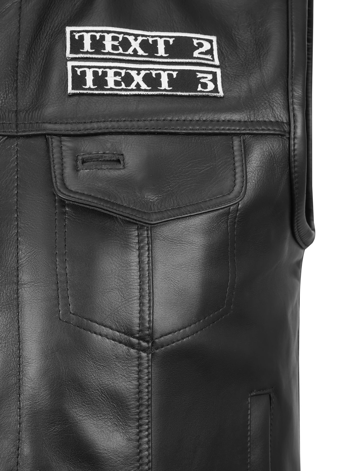 Close-up of embroidered patch detail on cowhide leather biker vest, showing precision stitching for custom club name, logo, or text. Premium leather vest for motorcycle riders and MC club members, designed with personalization options for identity, strength, and style in durable biker apparel.