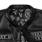 Close-up of genuine cowhide leather texture from custom embroidered biker vest, showing premium grain, durable stitching, and rugged handcrafted design. Personalized MC club vest with embroidered patches, concealed carry option, and multi-pocket layout for motorcycle riders.