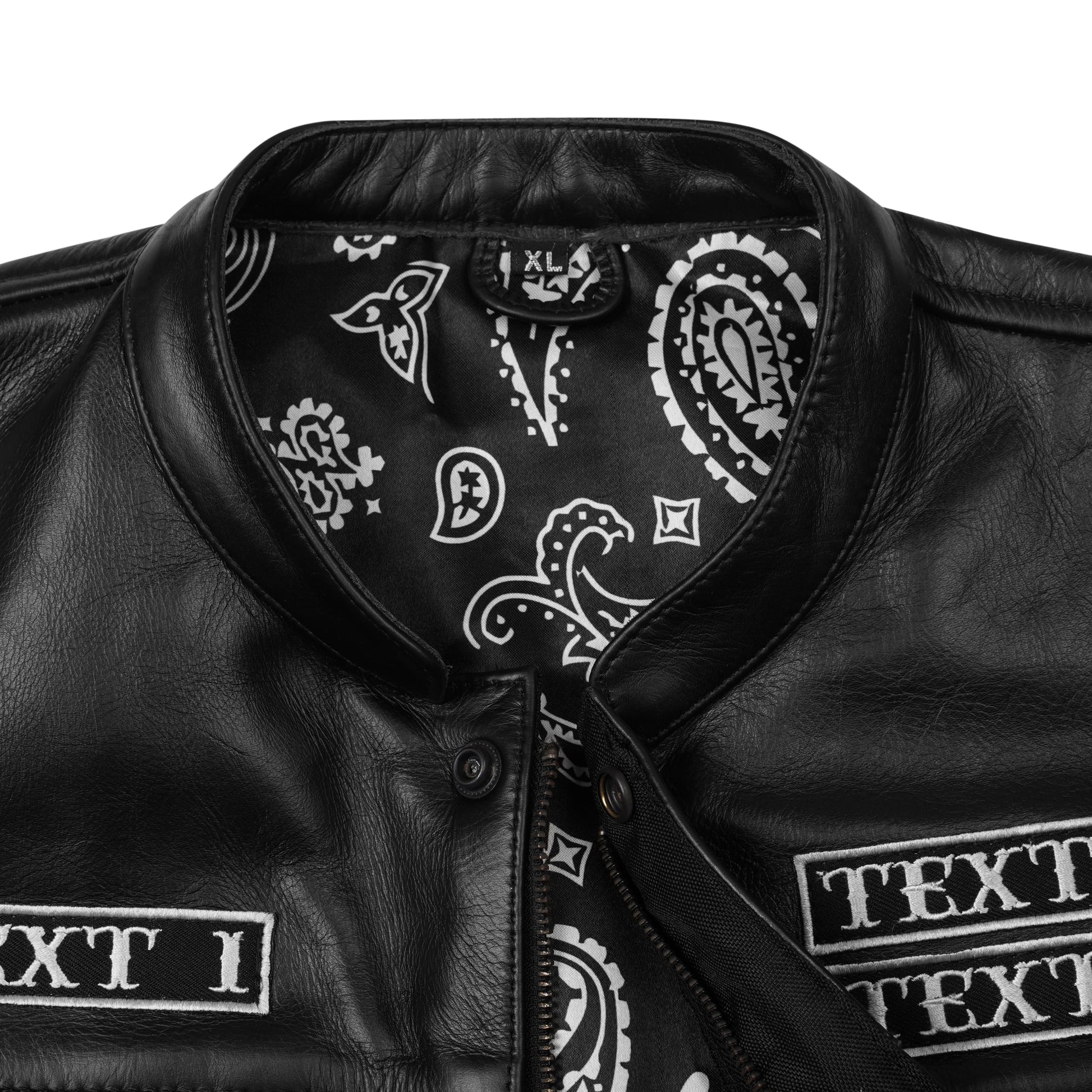 Close-up of genuine cowhide leather texture from custom embroidered biker vest, showing premium grain, durable stitching, and rugged handcrafted design. Personalized MC club vest with embroidered patches, concealed carry option, and multi-pocket layout for motorcycle riders.