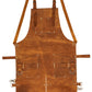 Detailed close-up of Ironhide Work Apron’s tool loops, pockets, and textured pull-up cowhide leather. Thick leather surface and premium brass hardware reflect quality craftsmanship. Ideal for hands-on professionals and hobbyists who demand strength, comfort, and performance from their workshop gear.


