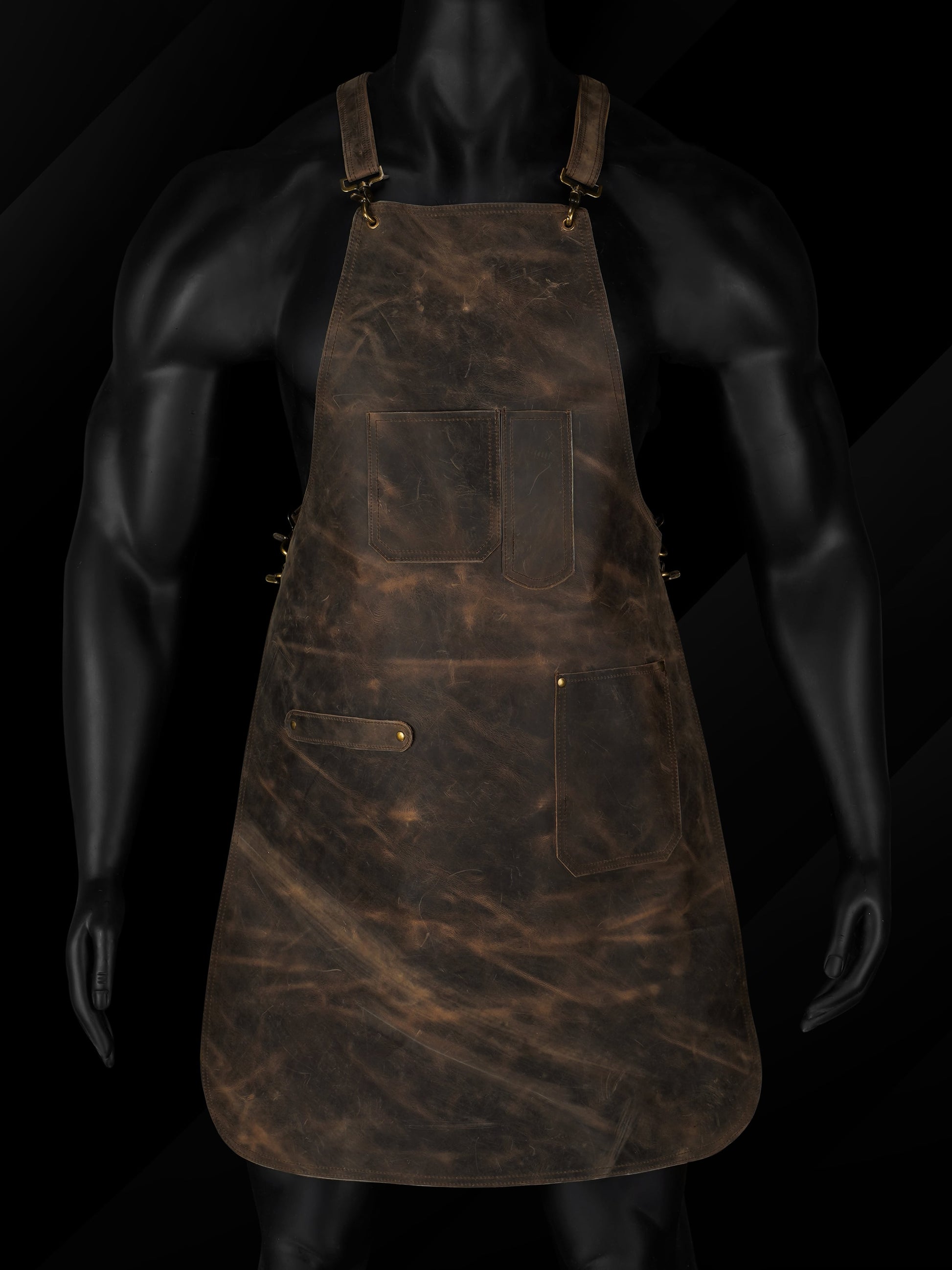 Handmade black pullup leather chef apron with adjustable cross-back straps and brass hardware, featuring multiple utility pockets. Ideal for grilling, hairstyling, and workshop tasks. Personalized apron with custom initials or logo, suitable for chefs, barbers, butchers, or craftsmen. Durable A+ grade leather workwear apron, perfect gift for Dad or professionals.

