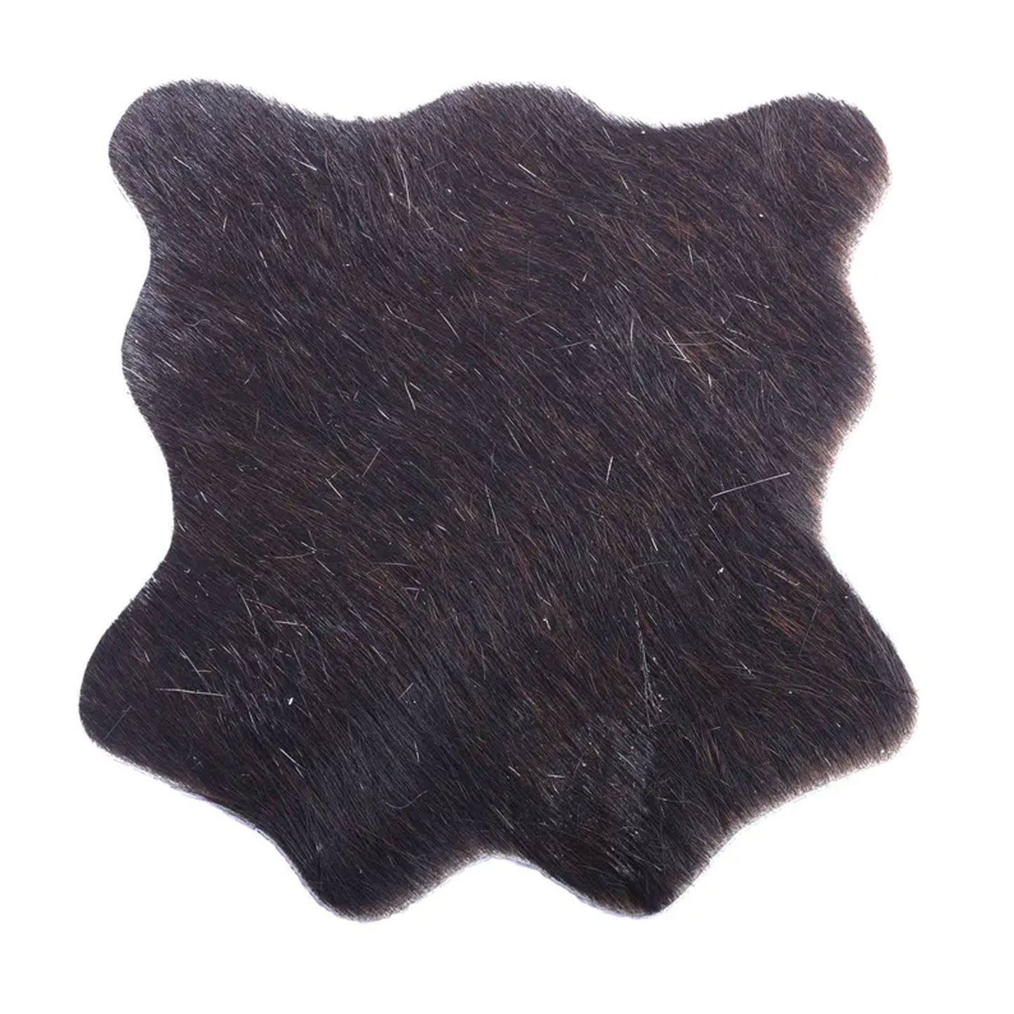 Leather coasters in use on a coffee table under mugs and tumblers, surrounded by books and decor, illustrating everyday functionality and stylish surface protection.

