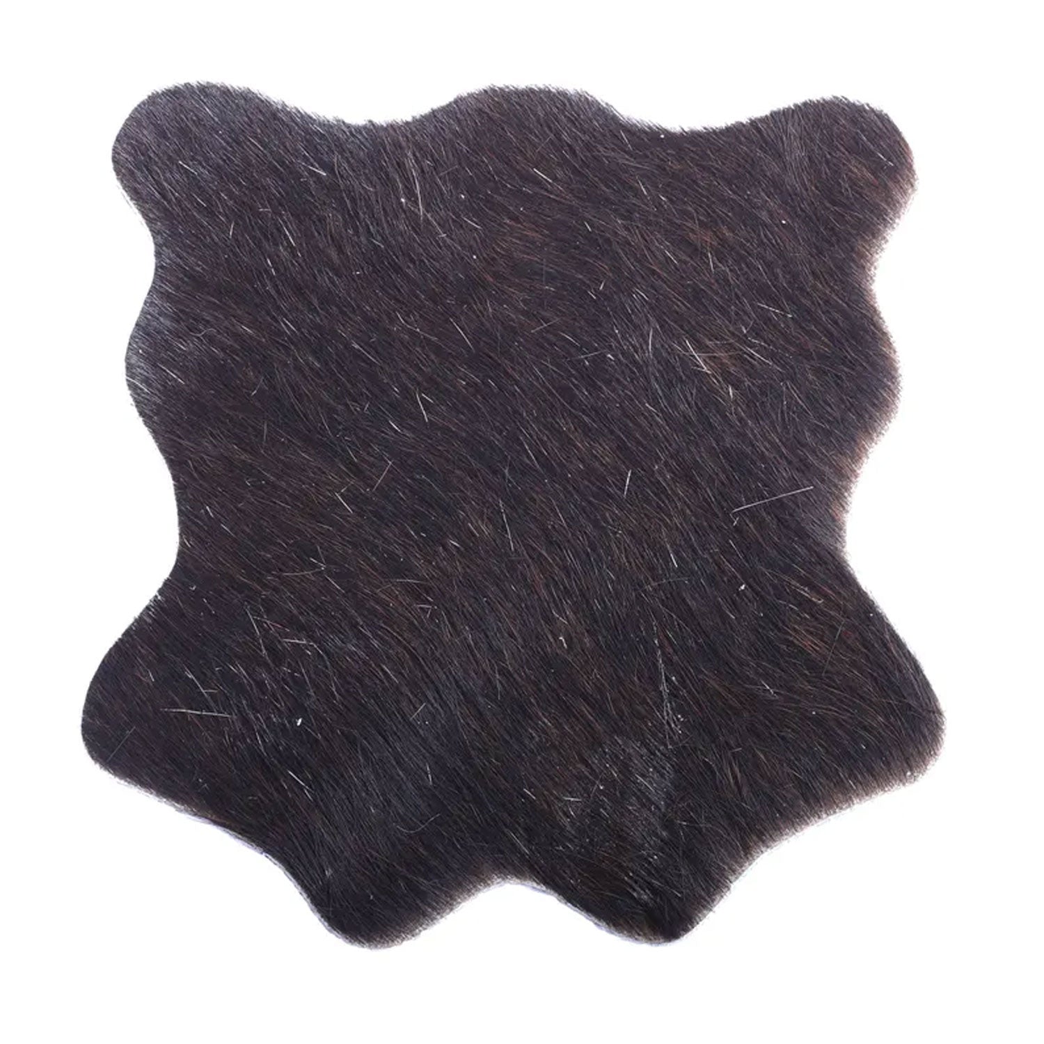 Leather coasters in use on a coffee table under mugs and tumblers, surrounded by books and decor, illustrating everyday functionality and stylish surface protection.

